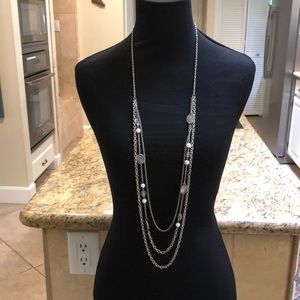 Long silver tone and white necklace 22” drop. Costume.
